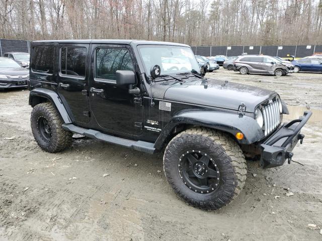 1C4BJWEG3GL172255 - 2016 JEEP WRANGLER U SAHARA BLACK photo 4