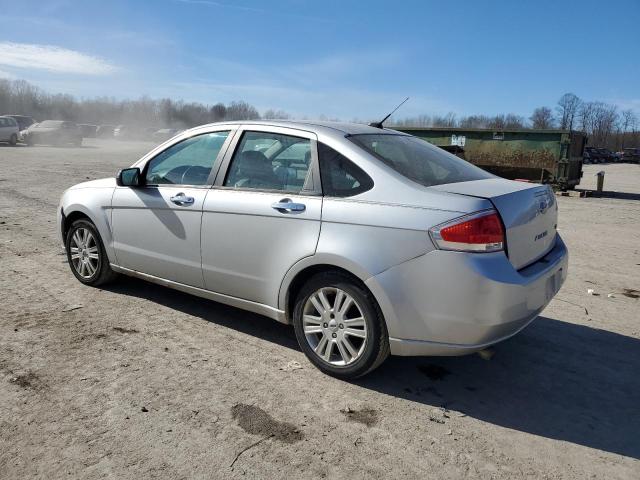 1FAHP3HNXAW216958 - 2010 FORD FOCUS SEL SILVER photo 2