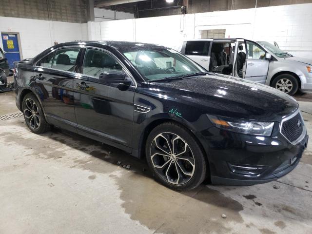 1FAHP2KT2HG125673 - 2017 FORD TAURUS SHO BLACK photo 4