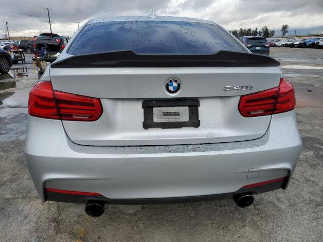 WBA8B3G56JNV01251 - 2018 BMW 340 I SILVER photo 6