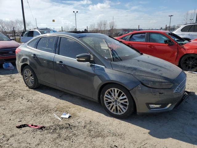 1FADP3J23HL243655 - 2017 FORD FOCUS TITANIUM GRAY photo 4