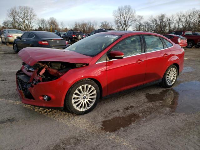 1FAHP3J29CL227552 - 2012 FORD FOCUS TITANIUM RED photo 1