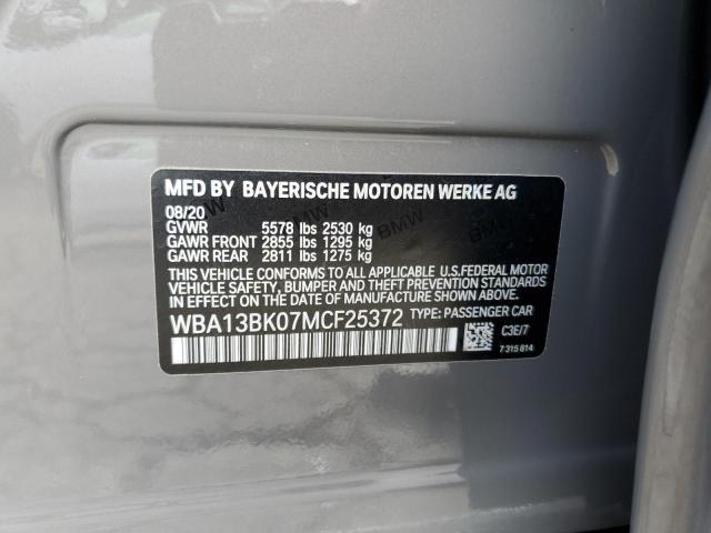 WBA13BK07MCF25372 - 2021 BMW M550XI GRAY photo 12