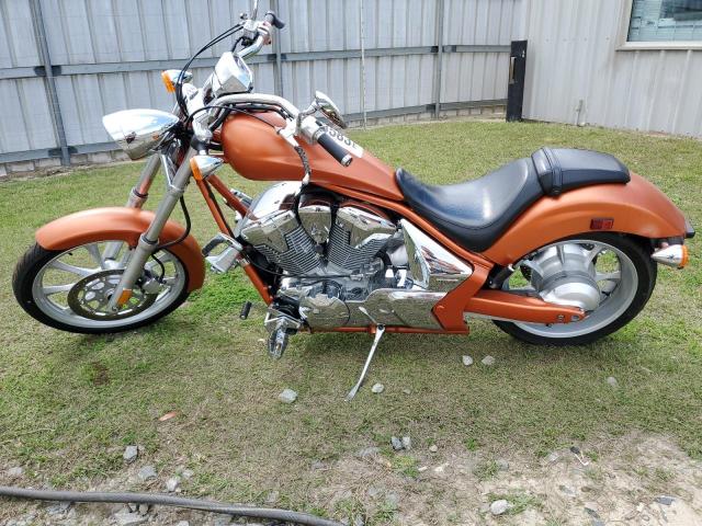 JH2SC6108BK100797 - 2011 HONDA VT1300 CX ORANGE photo 7