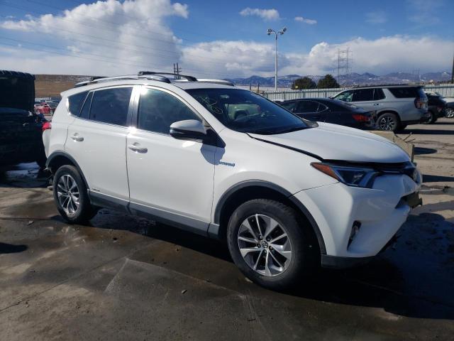 JTMRJREVXHD078318 - 2017 TOYOTA RAV4 HV LE WHITE photo 4