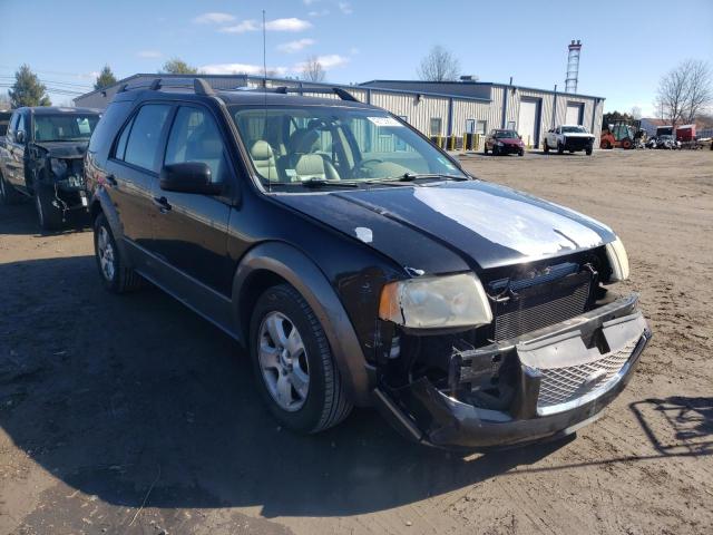 1FMDK02105GA76619 - 2005 FORD FREESTYLE SEL BLACK photo 4