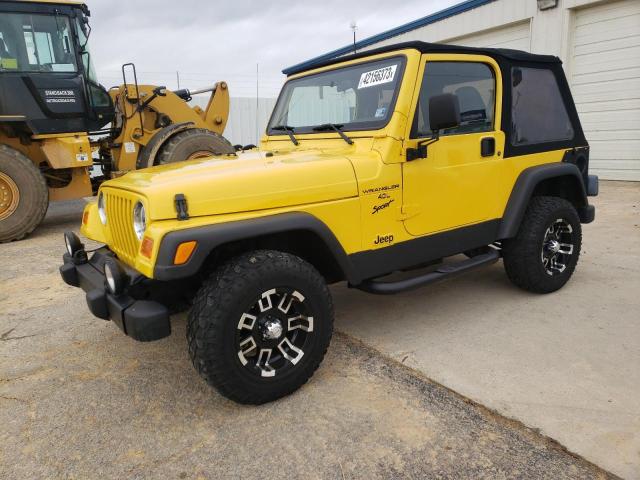 1J4FA49S12P700486 - 2002 JEEP WRANGLER / SPORT YELLOW photo 1