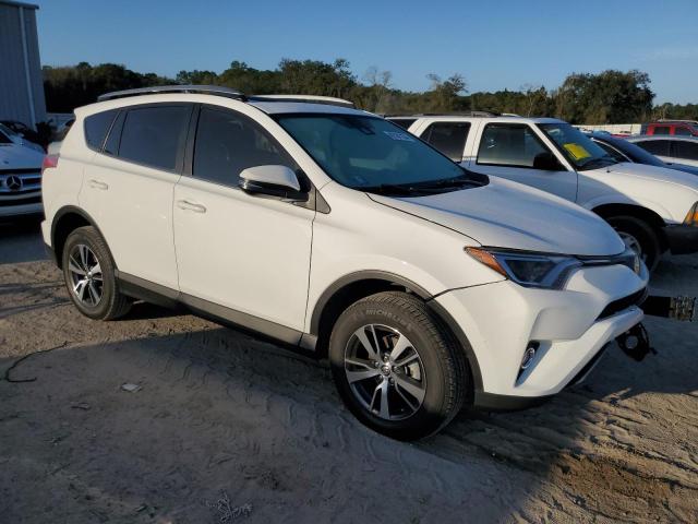 JTMWFREV4HD101404 - 2017 TOYOTA RAV4 XLE WHITE photo 4