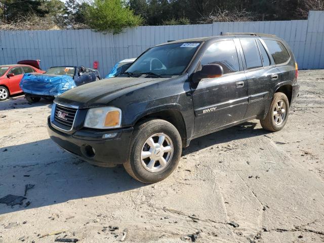 1GKDS13S442115519 - 2004 GMC ENVOY BLACK photo 1