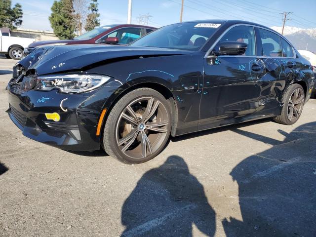 3MW5P9J08N8C65571 - 2022 BMW 330XE Қара фото 1