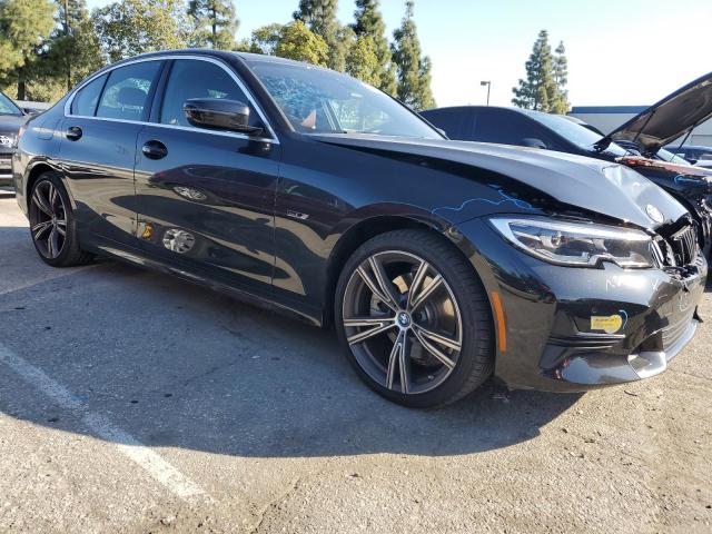 3MW5P9J08N8C65571 - 2022 BMW 330XE Қара фото 4