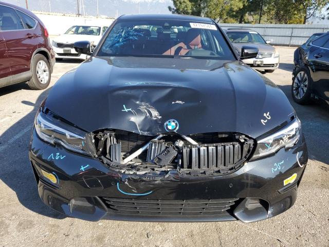 3MW5P9J08N8C65571 - 2022 BMW 330XE Қара фото 5