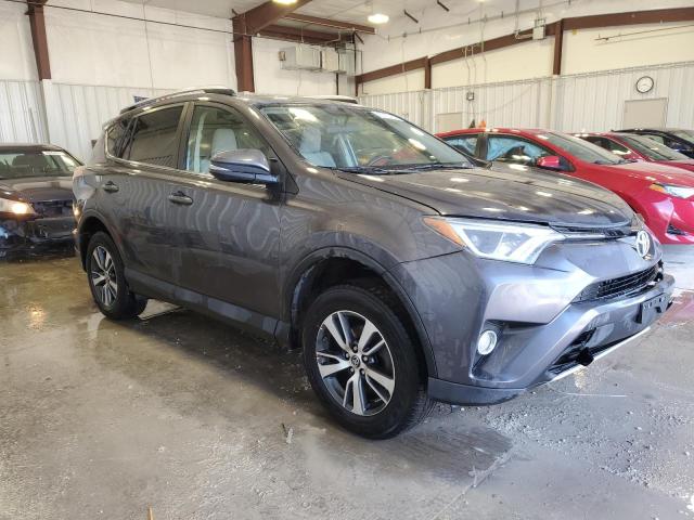 JTMWFREV2GJ060206 - 2016 TOYOTA RAV4 XLE GRAY photo 4