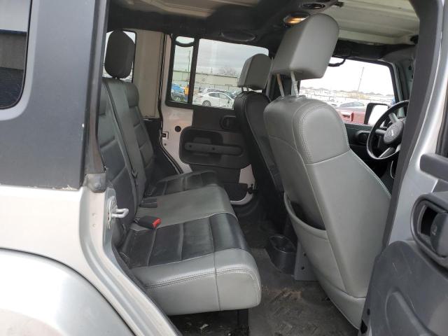 1J4BA5H19AL220540 - 2010 JEEP WRANGLER U SAHARA SILVER photo 11