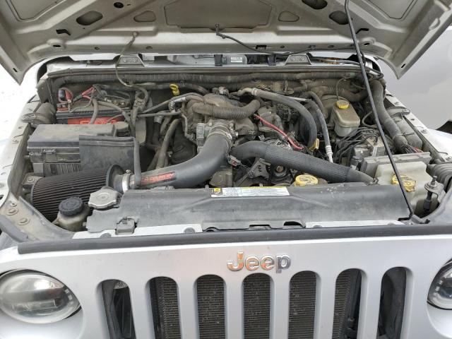 1J4BA5H19AL220540 - 2010 JEEP WRANGLER U SAHARA SILVER photo 12