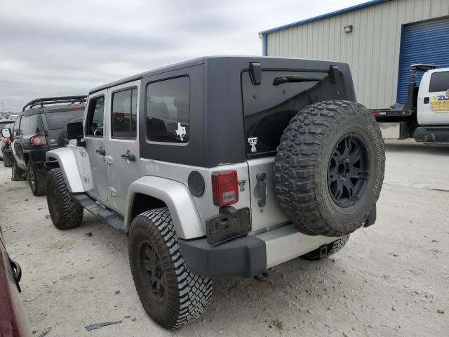 1J4BA5H19AL220540 - 2010 JEEP WRANGLER U SAHARA SILVER photo 2