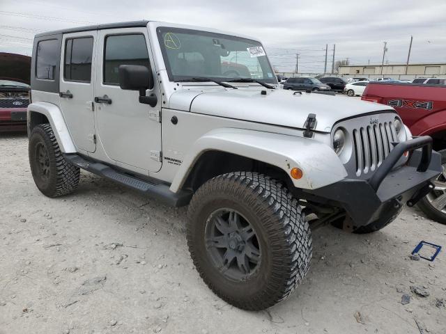 1J4BA5H19AL220540 - 2010 JEEP WRANGLER U SAHARA SILVER photo 4