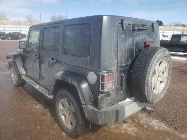1J4GA59178L636780 - 2008 JEEP WRANGLER U SAHARA BLACK photo 2