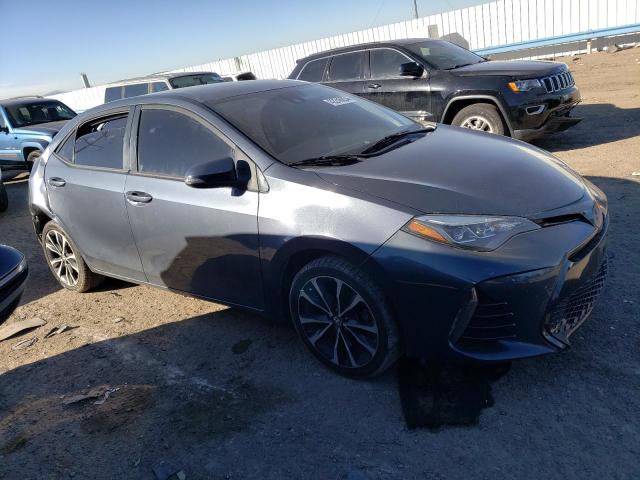 5YFBURHE0HP572415 - 2017 TOYOTA COROLLA L BLUE photo 4