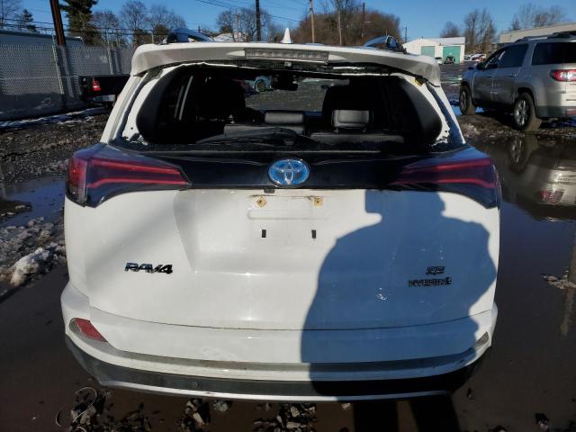 JTMJJREV9JD259445 - 2018 TOYOTA RAV4 HV SE WHITE photo 6