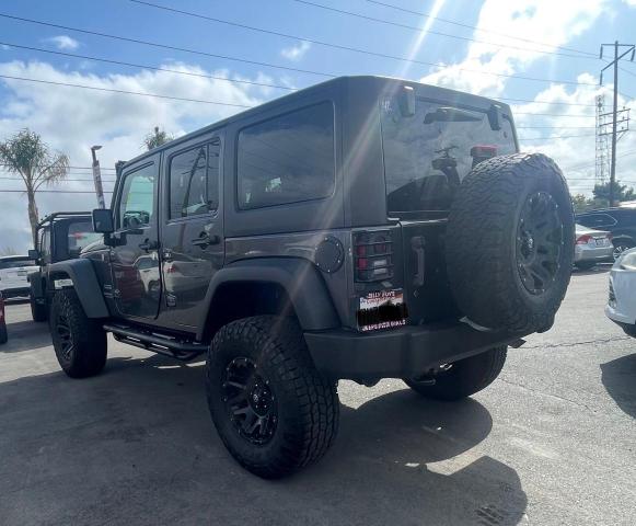 1C4BJWDG7GL310266 - 2016 JEEP WRANGLER U SPORT ნაცრისფერი ფოტო 3