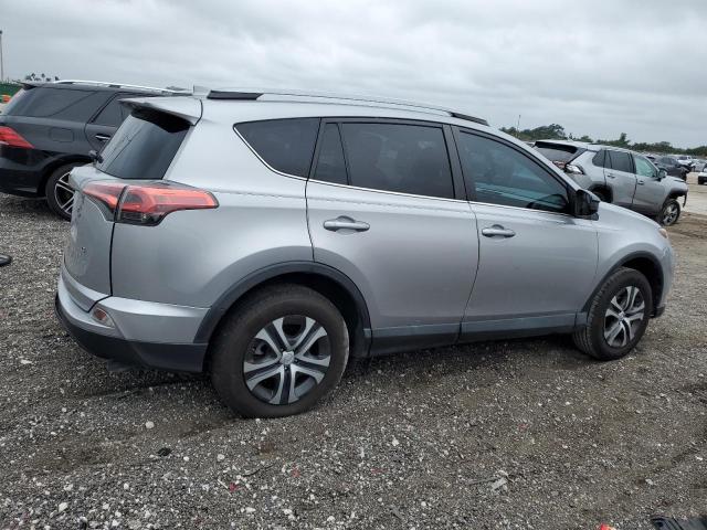 2T3ZFREV9HW389789 - 2017 TOYOTA RAV4 LE SILVER photo 3