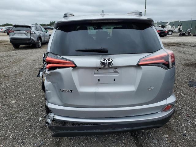 2T3ZFREV9HW389789 - 2017 TOYOTA RAV4 LE SILVER photo 6