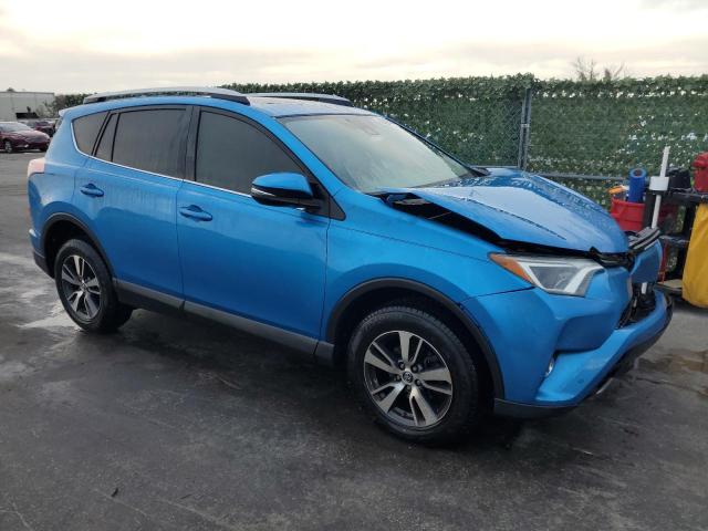 JTMWFREV6JD122230 - 2018 TOYOTA RAV4 ADVENTURE BLUE photo 4