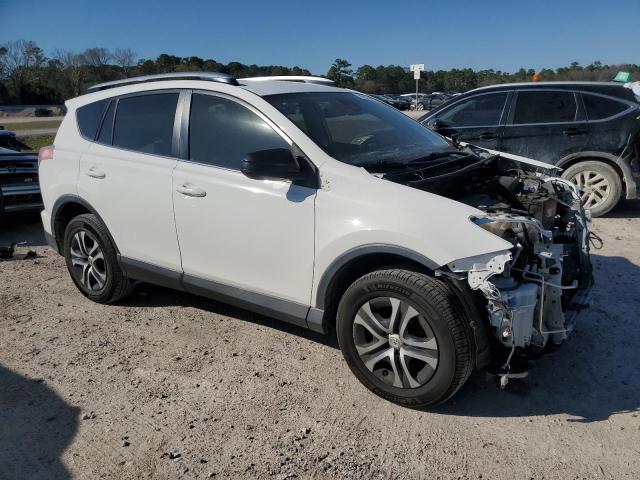 JTMZFREV1HJ700890 - 2017 TOYOTA RAV4 LE WHITE photo 4