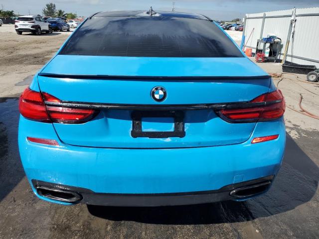 WBA7F0C34HGM22159 - 2017 BMW 750 I BLUE photo 6