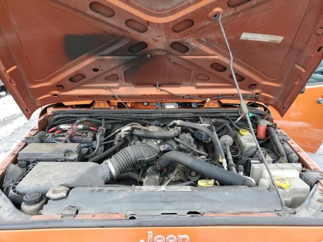 1J4BA3H14BL525594 - 2011 JEEP WRANGLER U SPORT ORANGE photo 11