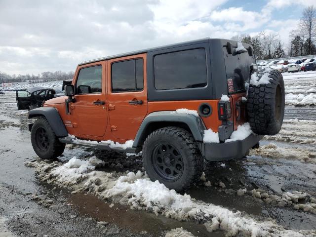 1J4BA3H14BL525594 - 2011 JEEP WRANGLER U SPORT ORANGE photo 2