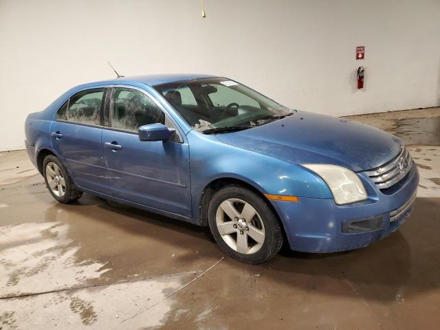 3FAHP07189R203878 - 2009 FORD FUSION SE BLUE photo 4