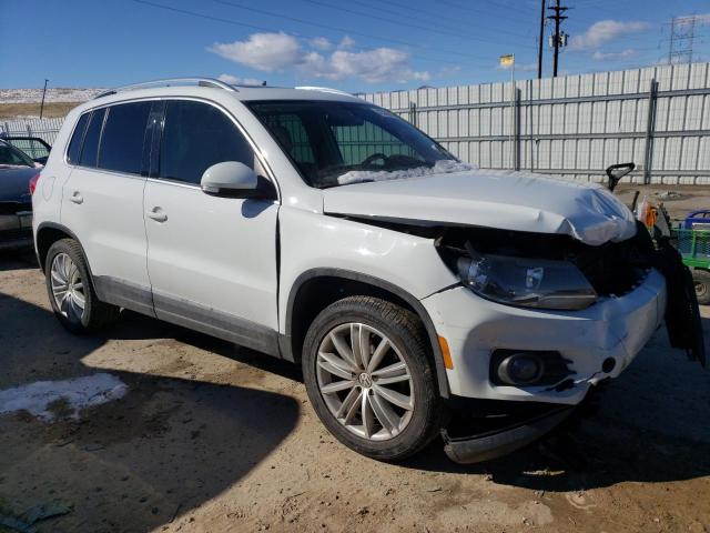 WVGBV3AX8EW604984 - 2014 VOLKSWAGEN TIGUAN S WHITE photo 4