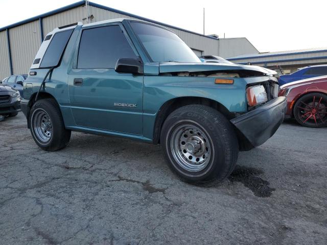 2S3TC02CXV6408694 - 1997 SUZUKI SIDEKICK JX TEAL photo 4