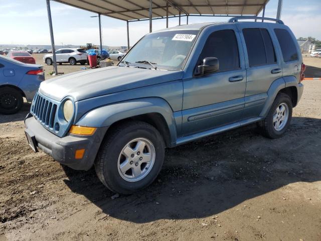 1J4GK48K76W261597 - 2006 JEEP LIBERTY SPORT BLUE photo 1