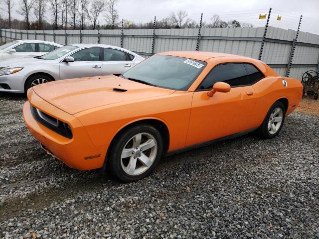 2C3CDYAG2CH128157 - 2012 DODGE CHALLENGER SXT ORANGE photo 1