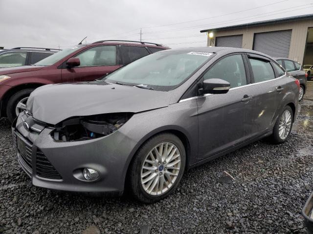 1FAHP3H27CL374295 - 2012 FORD FOCUS SEL GRAY photo 1