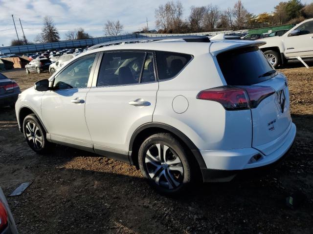 JTMBFREV9JJ721719 - 2018 TOYOTA RAV4 LE WHITE photo 2