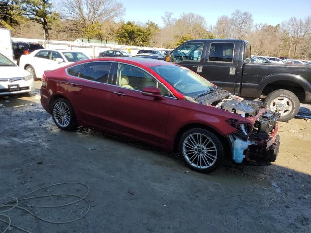 3FA6P0H91GR102982 - 2016 FORD FUSION SE MAROON photo 4