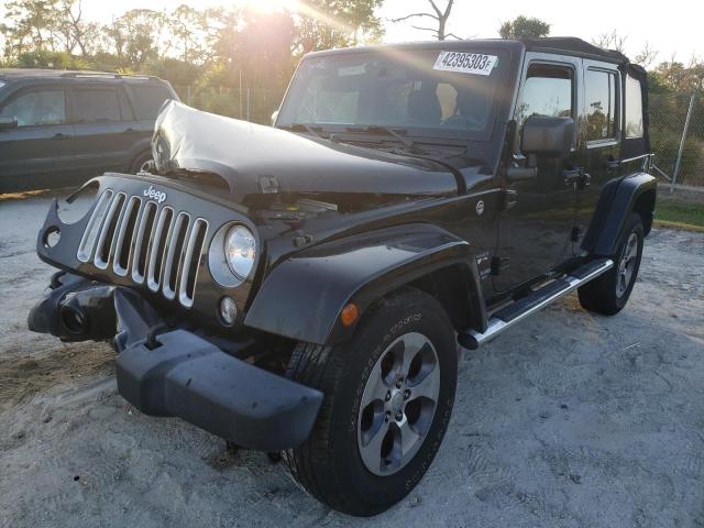 1C4HJWEG4GL178625 - 2016 JEEP WRANGLER U SAHARA BLACK photo 1
