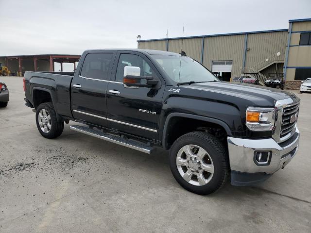 1GT12TEG9HF175409 - 2017 GMC SIERRA K2500 SLT BLACK photo 4