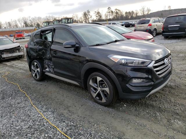 KM8J33A26JU721300 - 2018 HYUNDAI TUCSON VALUE BLACK photo 4