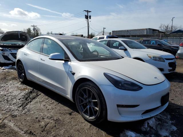 5YJ3E1EA7PF571132 - 2023 TESLA MODEL 3 WHITE photo 4