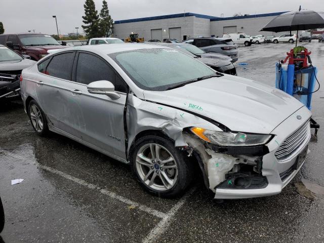 3FA6P0LU8FR215807 - 2015 FORD FUSION SE HYBRID SILVER photo 4