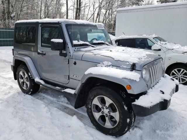 1C4AJWBG5GL112882 - 2016 JEEP WRANGLER SAHARA SILVER photo 4