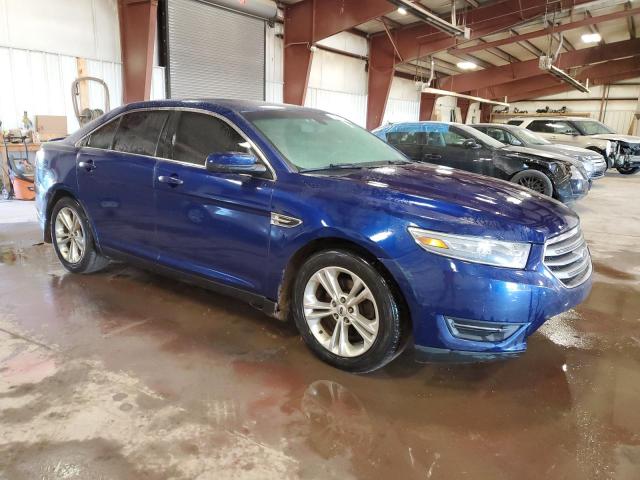 1FAHP2H85DG104779 - 2013 FORD TAURUS SEL BLUE photo 4