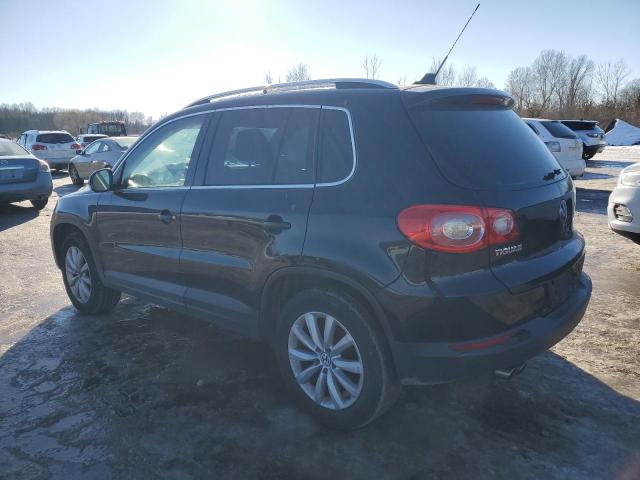 WVGAV7AX8BW526527 - 2011 VOLKSWAGEN TIGUAN S BLACK photo 2