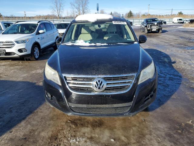 WVGAV7AX8BW526527 - 2011 VOLKSWAGEN TIGUAN S BLACK photo 5