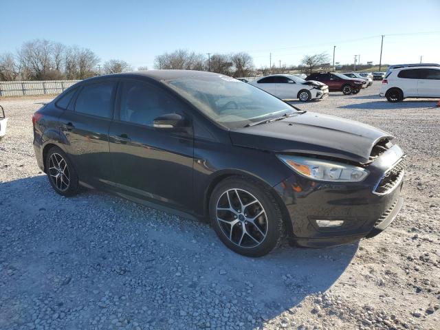 1FADP3F26FL313784 - 2015 FORD FOCUS SE BLACK photo 4